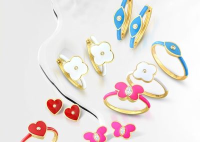 enamel jewelry in bright colors with a diamond center piece